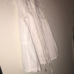 White dr type coat but with no sleeves